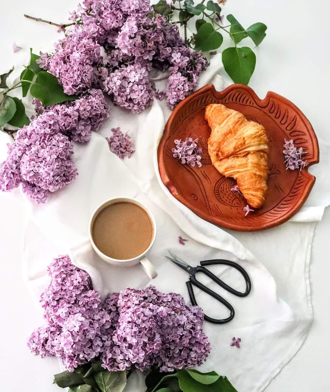 Cup of coffee with flowers